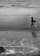 kids running in surf