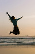 jumping on the beach