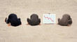 three heads in the sand