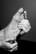 reflexology massage on aged foot