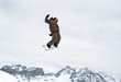 snowboarder jumping high in the air