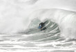 bodyboarder inside a tube