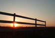 sunset on a horse stable