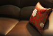 pillow on a leather sofa