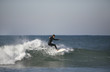surfer with a blue sky
