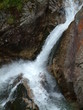 a small waterfall in the mountains