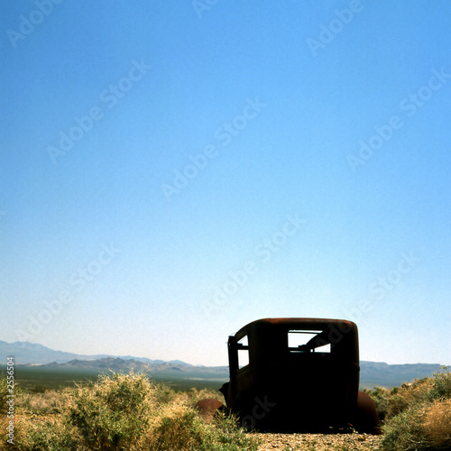 old rusty car in the desert