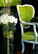 green chair in store window