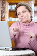 mature woman using laptop