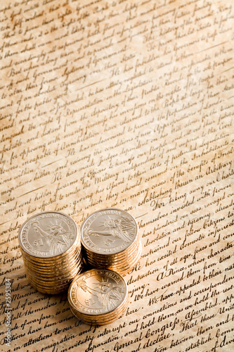 Photo: dollar coin on declaration dollar coin on declaration