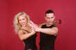laughing blondie and hot macho dancing tango