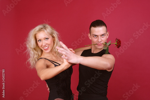 laughing blondie and hot macho dancing tango