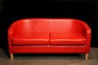 Photo: retro red sofa in dark room retro red sofa in dark room