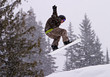 jumping with a snowboard