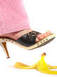 female leg(foot) and peel of a banana. life insurance.