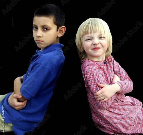 Photo: two kids at odds two kids at odds