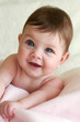 Foto: cute smiling baby on blanket cute smiling baby on blanket