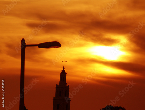 Photo: street light with glorious sunset in background street light with glorious sunset in background