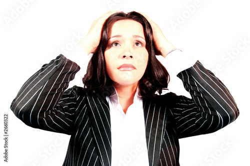Photo: beautiful brunette business woman stressed and overworked beautiful brunette business woman stressed and overworked