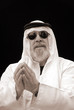 the chic sheik wears sunglasses