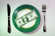 dollars as meal on a plate