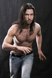 dynamical beautiful man with a naked torso