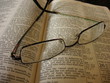 reading glasses on bible