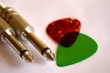 guitar picks and cable jacks