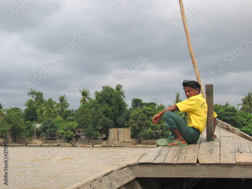boat with a birman crossing the chindwin river, hpo win daung, m boat with a birman crossing the chindwin river, hpo win daung, m