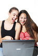 giggling teens surf