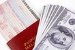 airline ticket and money
