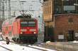 train at sunrise entering dresden station
