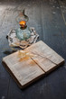 book of poetry and ancient oil lamp