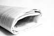 rolled newspaper