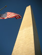 washington monument with the us flag on the national mall