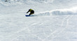 a man extreme snowboard riding