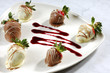 chocolate dipped strawberries with raspberry sauce