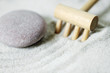 zen pebble to left with rake