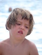 unhappy girl at beach