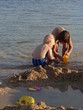 kids playing in beach sand