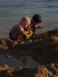 kids playing in beach sand