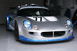 silver racing car in garage