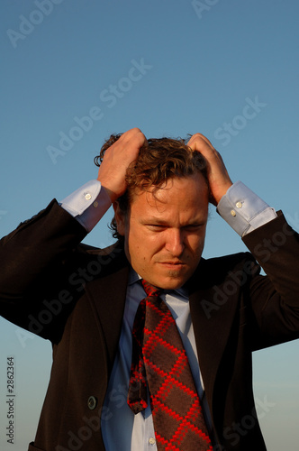 Photo: stressed business man or salesman stressed business man or salesman