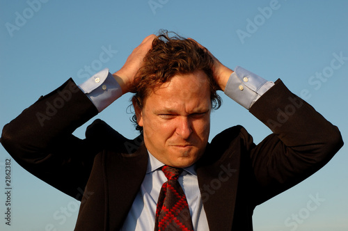 Photo: stressed businessman stressed businessman