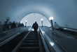 commuters in moscow metro on escalator steps commuters in moscow metro on escalator steps