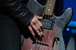 playing old bass guitar