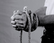 with tied hands