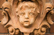 terra cotta cherub's face terra cotta cherub's face