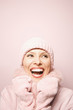 Photo: caucasian woman wearing winter coat and hat. caucasian woman wearing winter coat and hat.
