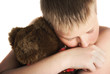 sad boy with teddy